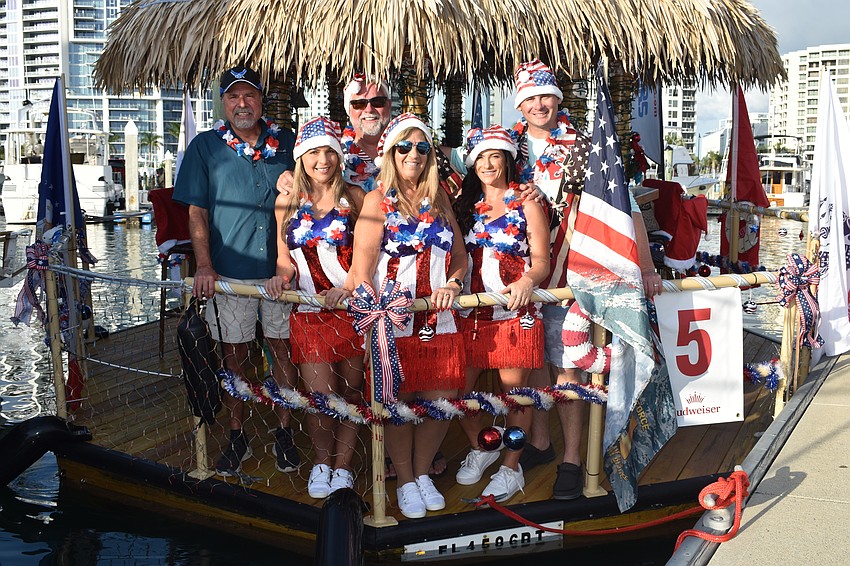 Tom Sweat, Brittany Pecora, Captain Bill Hogan, Marsha Bishop, Jessica Bishop, and Mike Bishop aboard Tuff Tiki