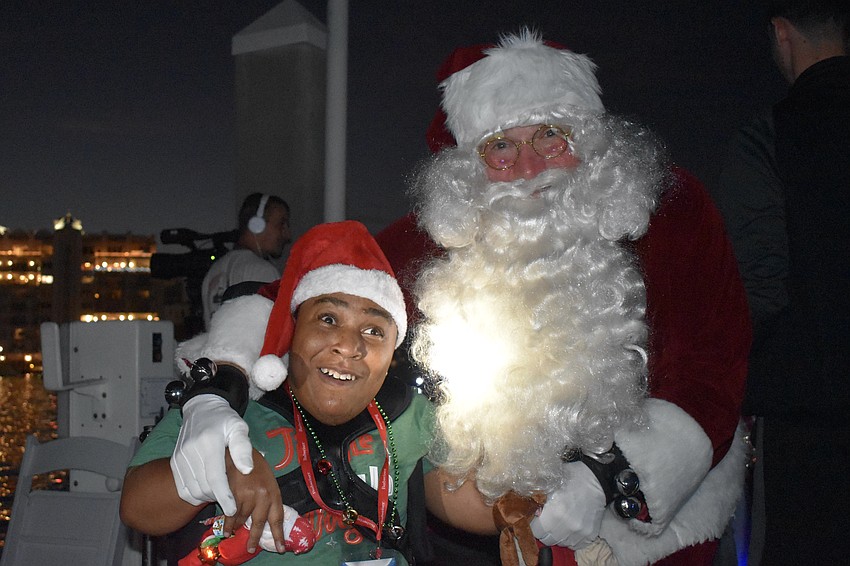 Nadia McKinnon, a resident of The Haven, meets Santa Claus.