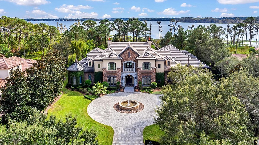 The home at 6507 Rosella Court, Windermere, sold Dec. 8, for $5,900,000. This lakefront home by Stonebridge Custom Homes boasts more than 10,000 square feet of living space. The sellers were represented by Deanna Sechrest.