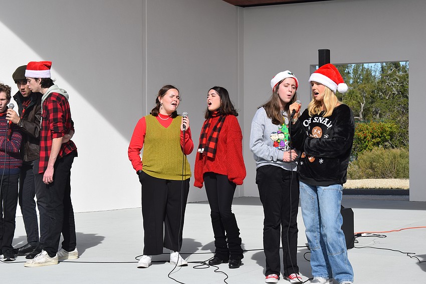 The Manatee School for the Arts Jazz Choir performed in the Karon Family Pavilion at Market on the Key.