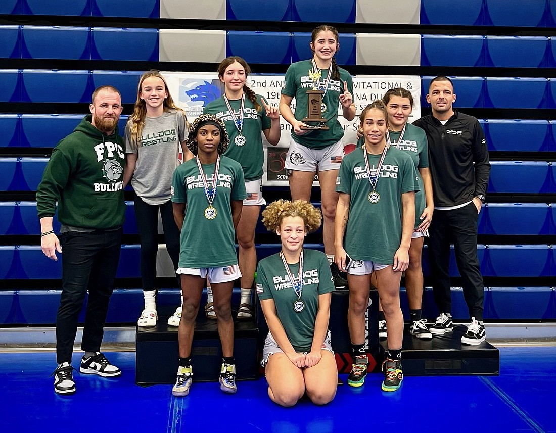 Flagler Palm Coast won the championship trophy at the Pineda Invitational girls wrestling tournament at Deltona High School. Courtesy photo
