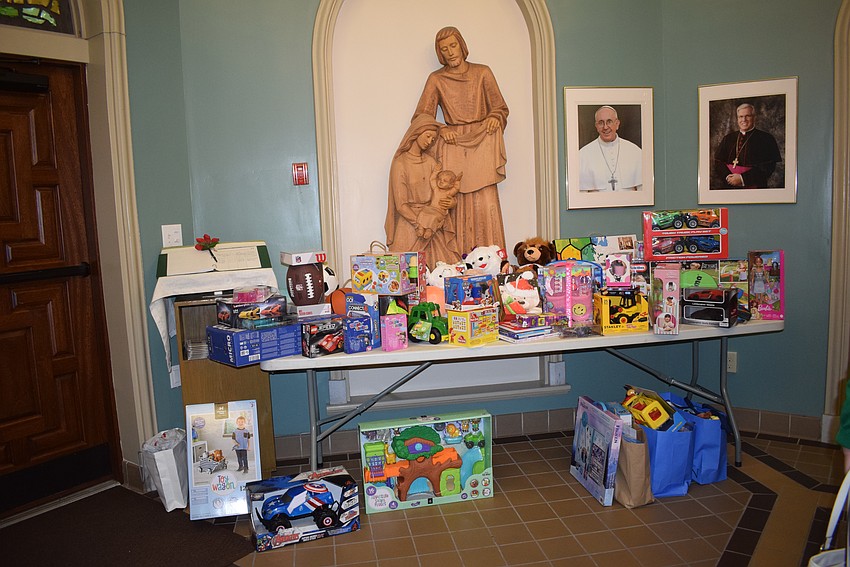 The Women's Guild of St. Mary Star of the Sea collected toys to donate needy children within the Diocese at the annual Christmas Concert on Dec. 15.
