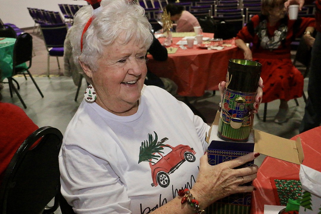 Home Instead, Flagler County Social Services hand out Christmas
