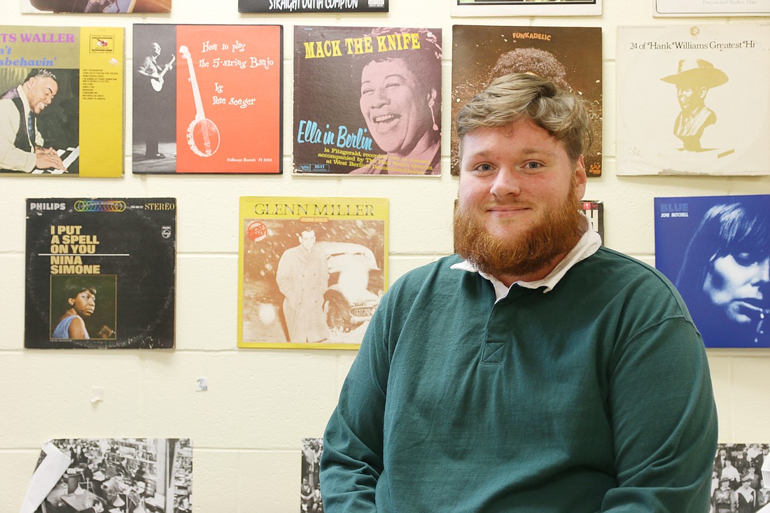 Stephen Gold, Mainland High School's Teacher of the Year, is a jazz music enthusiast. He keeps a wall of records in his classroom. Photo by Jarleene Almenas