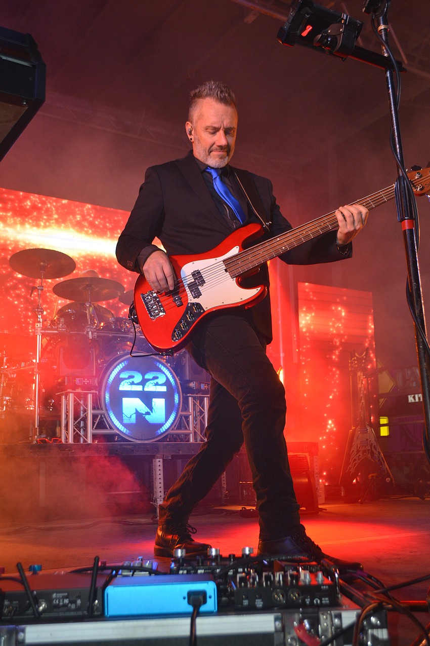 Gary Sobel of 22N rocks out on stage on New Year's Eve at the Sarasota Pineapple Drop Carnival.