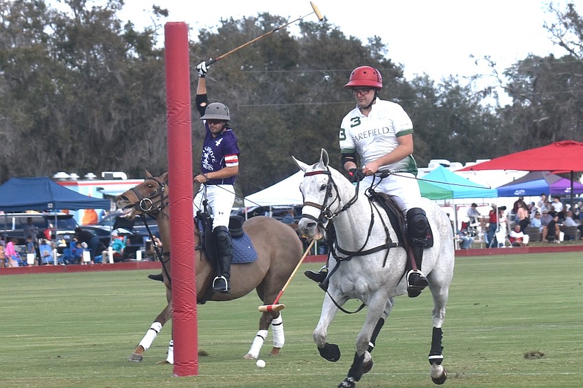 Barefield/Rawhide Creek's Joaquin Arguello rides through the mouth of the goal along with the ball as he scores in the Sarasota Polo Club season opener.