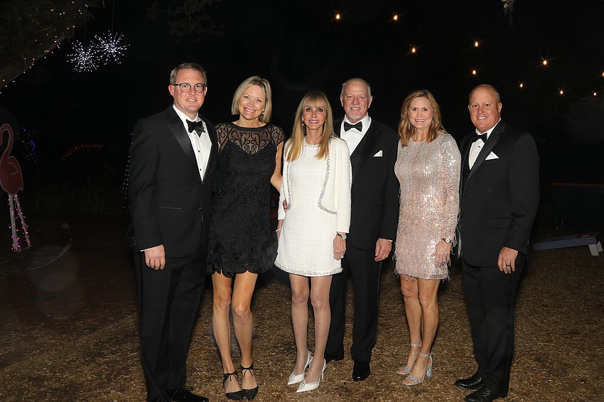 Aaron and Kristin West, Lisa and Bob Montgomery, and Kelley and Gavan Hunt