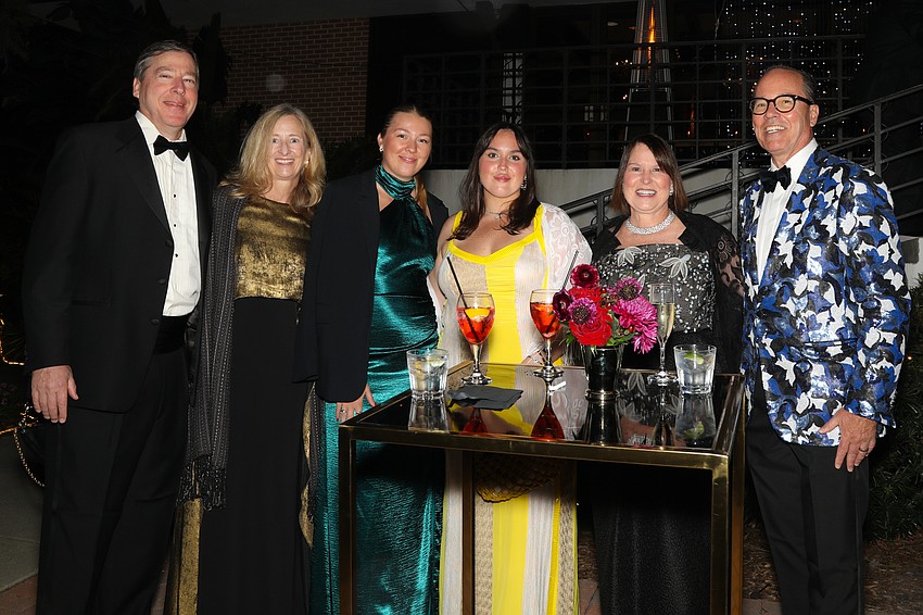 Bob, Debbie, and Tori Bridges with Lilly, Jill and Jim McNichols during the cocktail hour.