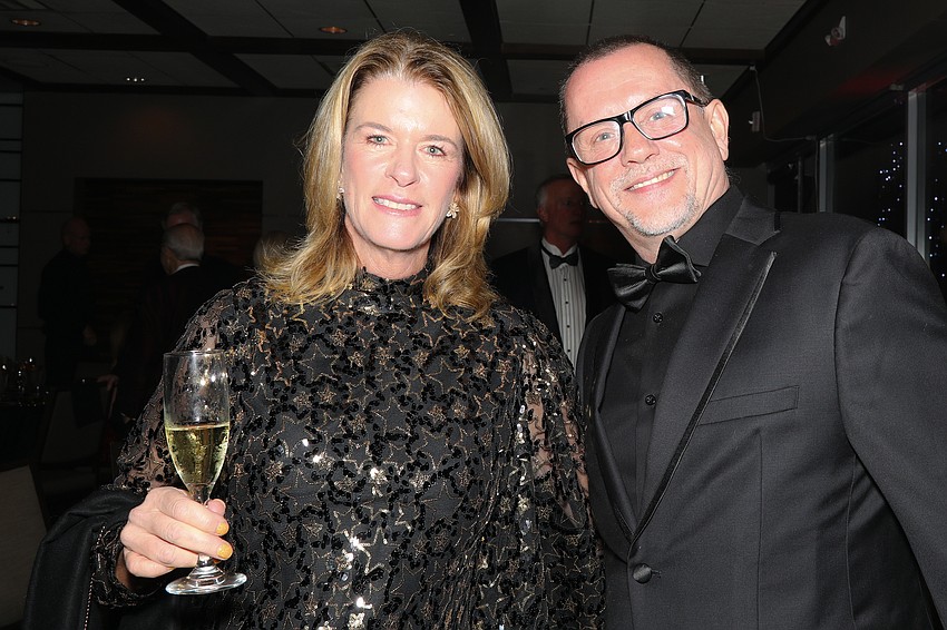 Elizabeth Moore and Iain Webb toast in the new year.