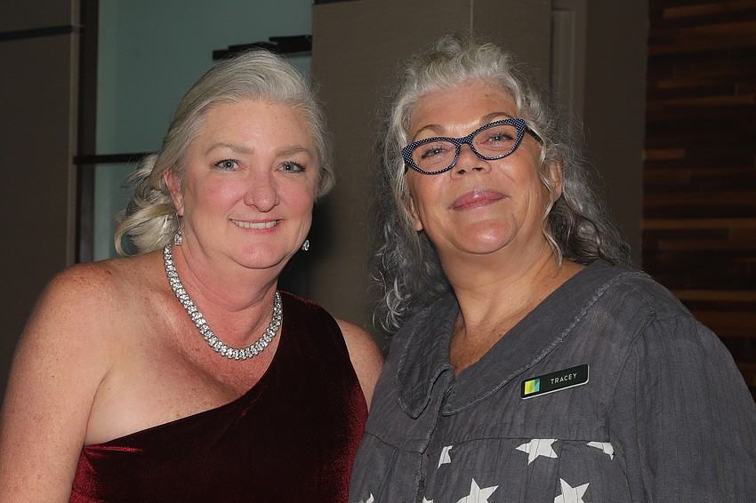 Julie Burton with Michael's on East Catering Queen, Tracey McCammack