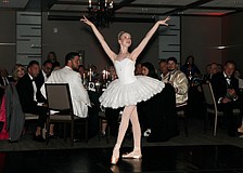 From the Sarasota Ballet's Margaret Barbieri Conservatory is Macie Miersch, 14, who performs a classical ballet dance between dinner courses.
