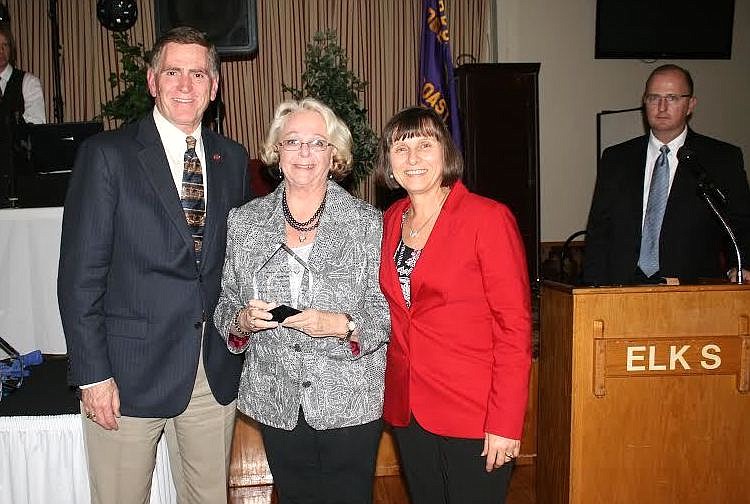 Winnie Oden, center, was honored as Citizen of the Year on Jan. 31, 2016, during the Public Safety Awards Ceremony at the Palm Coast Elks Lodge. Oden posed with Jimmy Millhollin and Annette Gardinal. File photo.