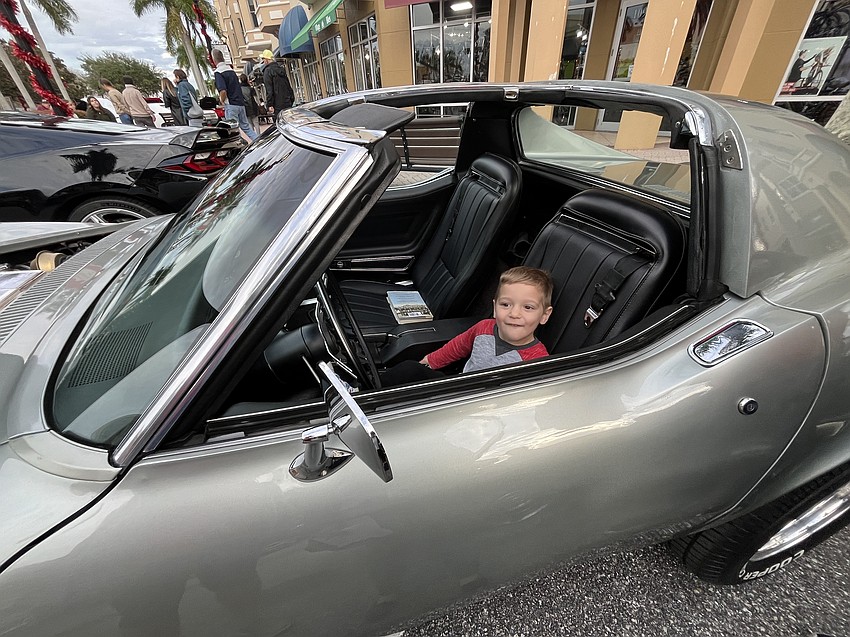 Lakewood Ranch 2-year-old AJ Gross has a chance to sit in a 1972 Corvette. Gross is a big car fan, especially Corvettes.