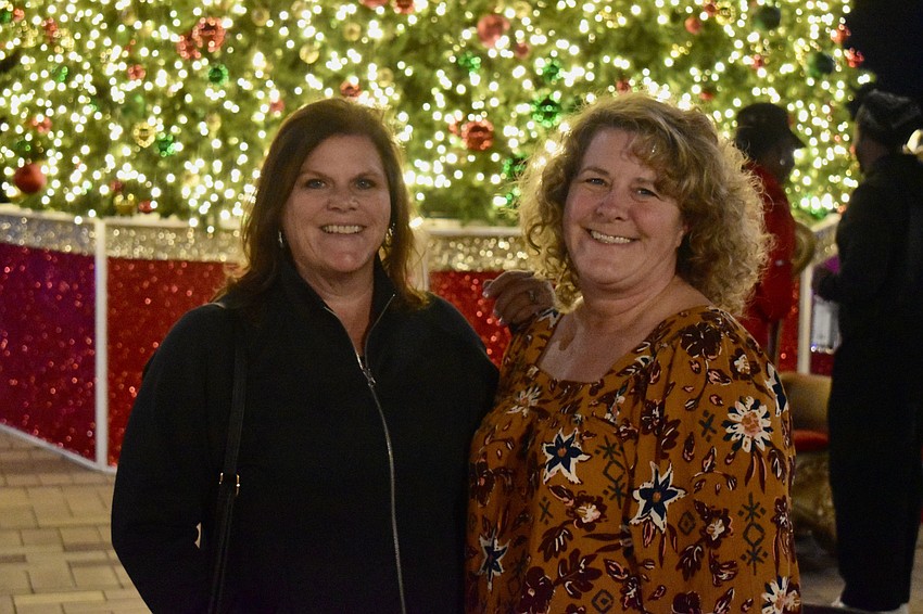 Kathy Zaccaria is encouraging Elizabeth Devaney to move to Florida with a tour of Waterside Place. Both women hail from New Jersey, but Zaccaria is a Floridian now.