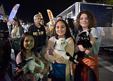 Chloe Quesada, Sofie Quesada and Addison Fierro bring 2-week-old goats to Ranch Nite Wednesday. They're yoga goats.