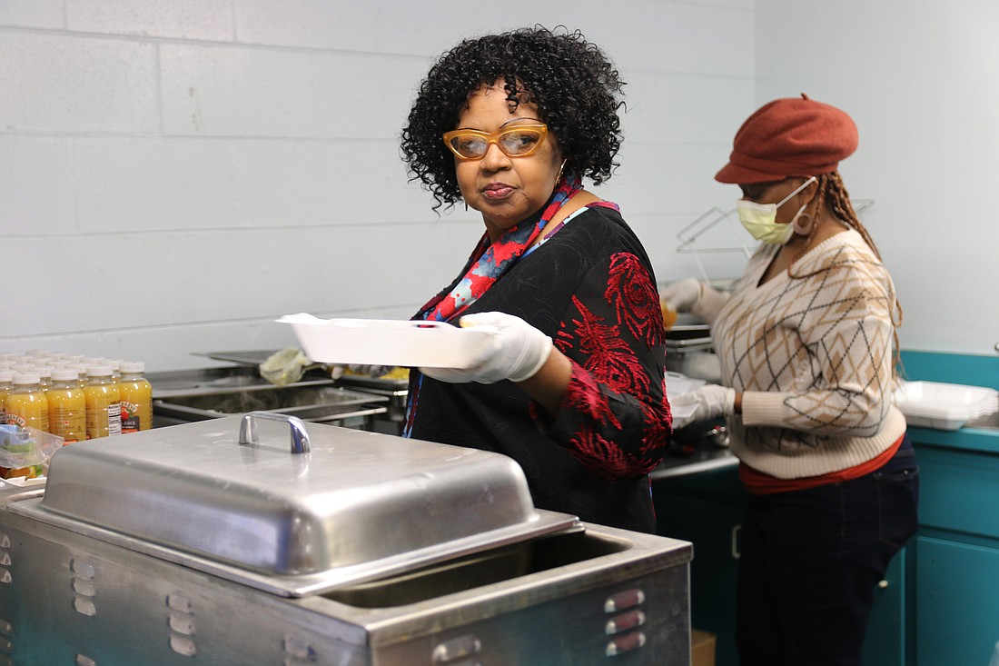 Jackie Fields and Andrea Wilson help serve breakfast during the 2023 Martin Luther King, Jr. breakfast celebration in Ormond Beach. File photo by Jarleene Almenas
