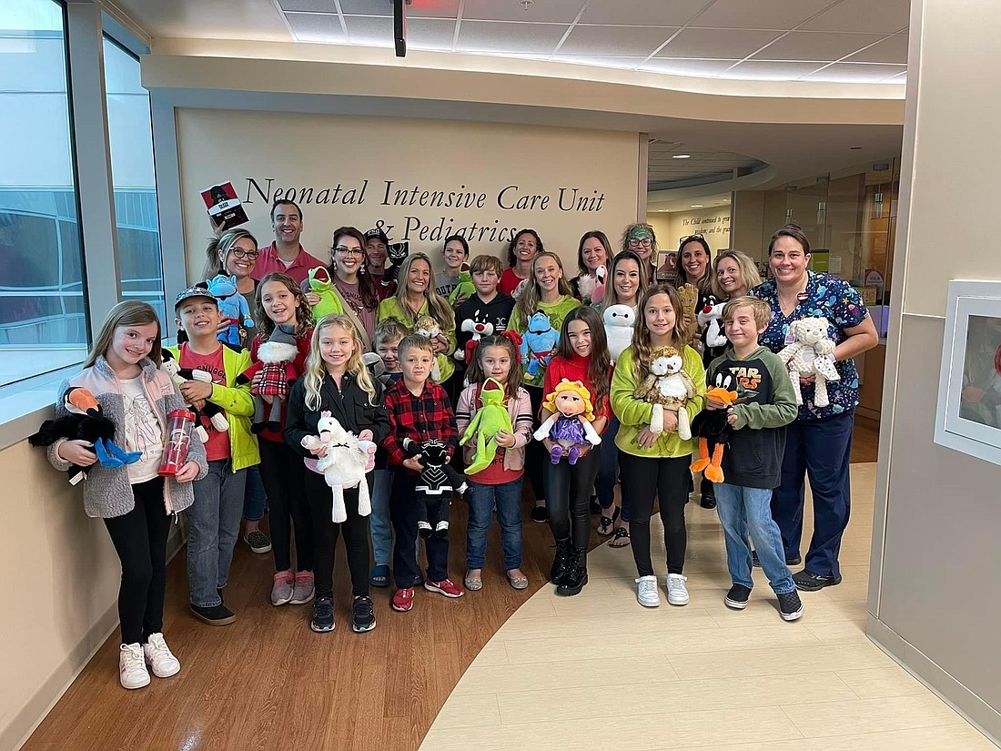 Ormond Beach residents Matt and Camila Forester donated over 1,000 Scentsy Buddies to local hospitals and police stations in December. Courtesy photo