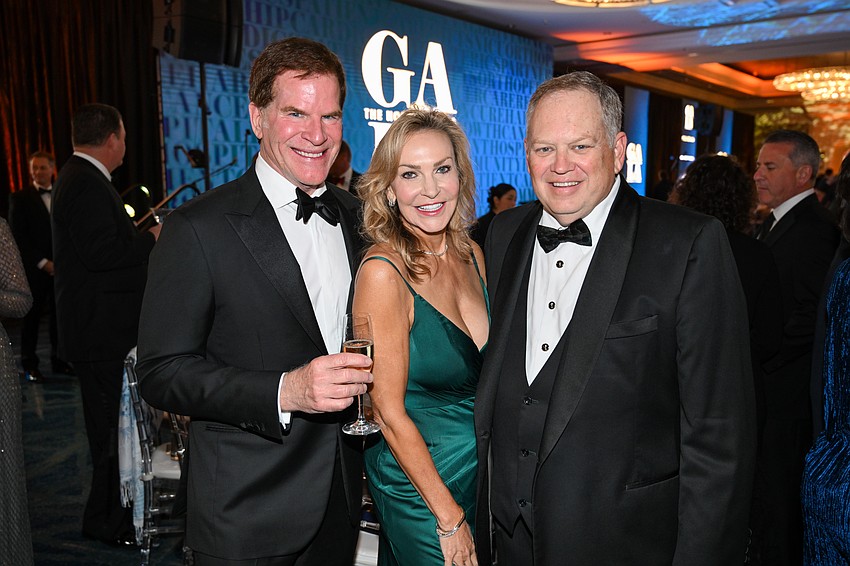 Jim and Christina Price with Sarasota Memorial Hospital CEO David Verinder