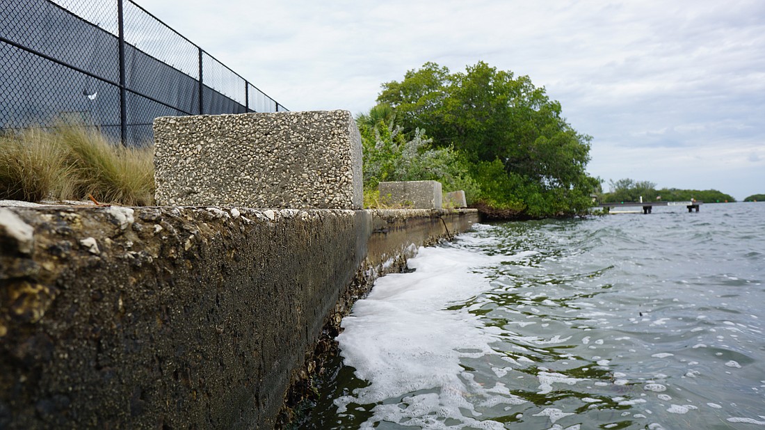 The existing concrete seawall on the north end of Bayfront Park will be replaced with a sloped living shoreline.