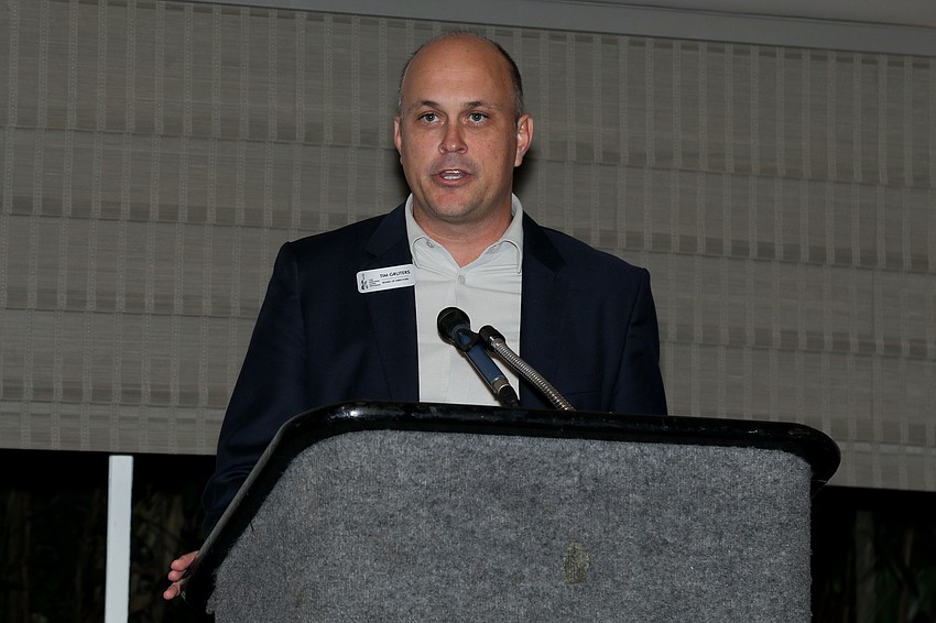 Board President Tim Gruters addresses attendees.