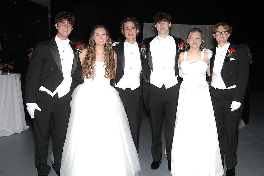 Debutante Charlotte Buckley and her escorts Joseph Marble and Jacobus Hazelhoff, and Debutante Chloe Niebuhr and her escorts, Grant Burroughs and Colby Kaighin.