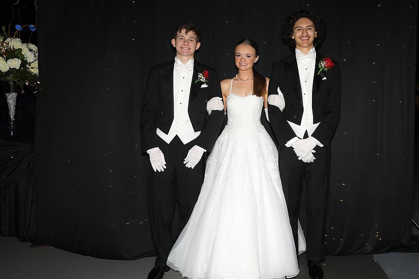 Debutante Madeline Crosby and her escorts, Andrew Sutter and Joe Clarke.