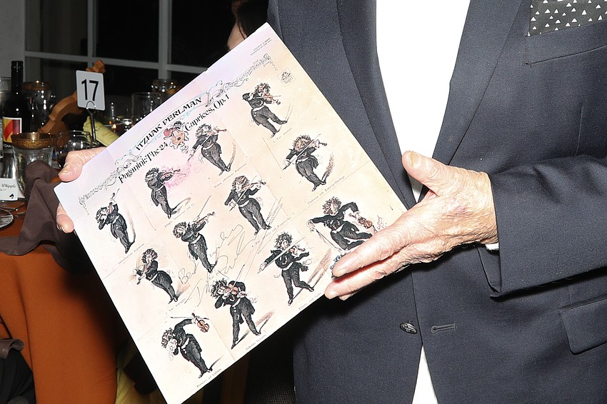 The ink is still wet as a very happy Ted Schvimer is photographed with his copy of a Perlman album, 