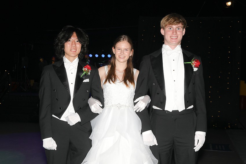 Debutante Kathryn Fulton and her escorts, Jacob Douglas and Robert Crisci.