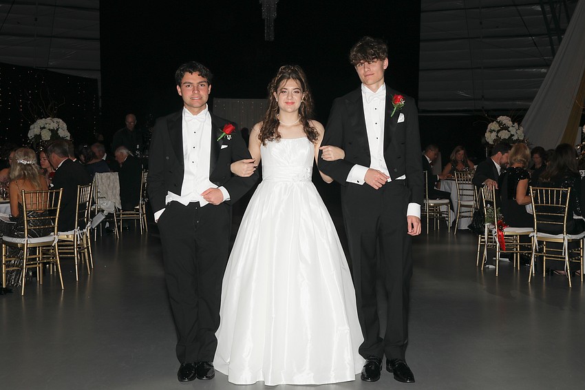 Debutante Sofie Niebuhr and her escorts, Jackson France and Kellan Floyd.
