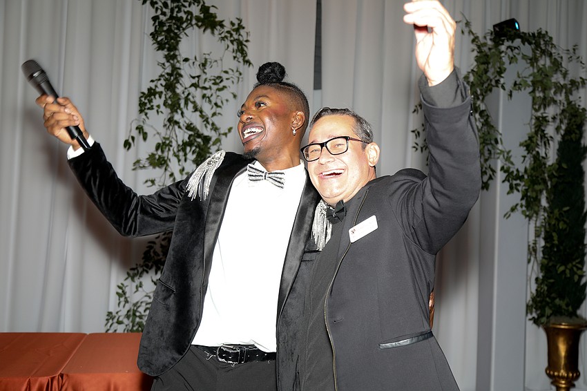 Jay Camaro performs hit songs while engaging with the crowd, including Concertmaster Marcus Ratzenboeck.