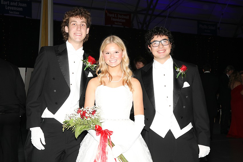 Debutante Maci Voigt and her escorts, Connor Lundy and Christopher Delgado.