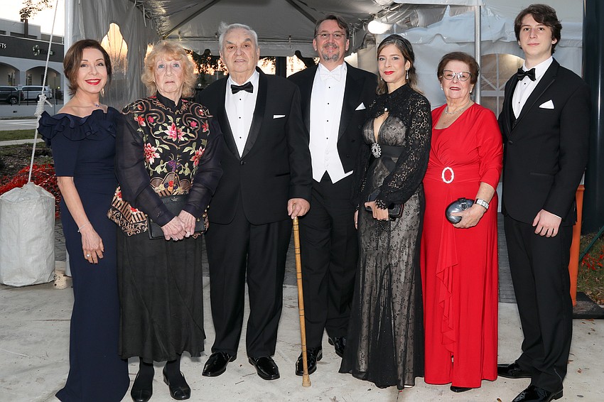 Violeta Sarcinelli attends the Debutante Ball with the Pellizzari Family, including Frances, Landy, Alex, Claudia, Rosalia and Daniel.