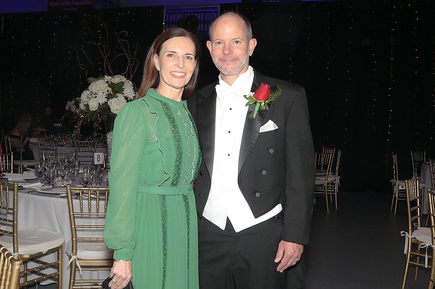 Attending for the presentation of their daughter Violet are Lisa and Orion Marx.