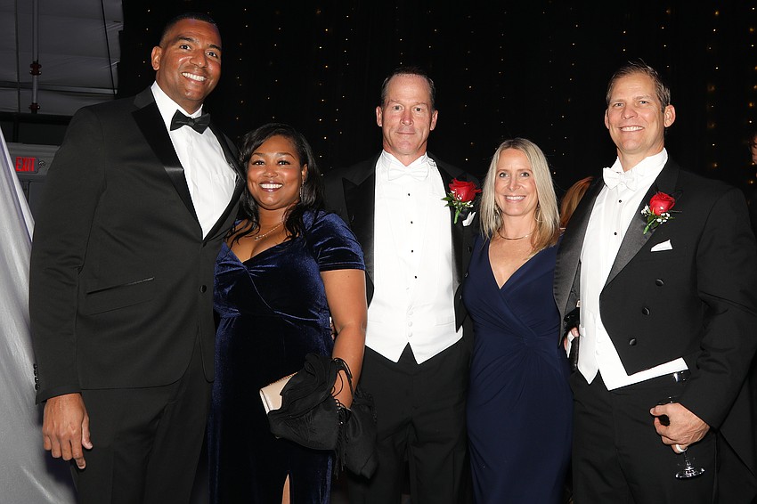 Mark and Nicole Bryan, Brad and Ally Frank, and Brandon Folkers.