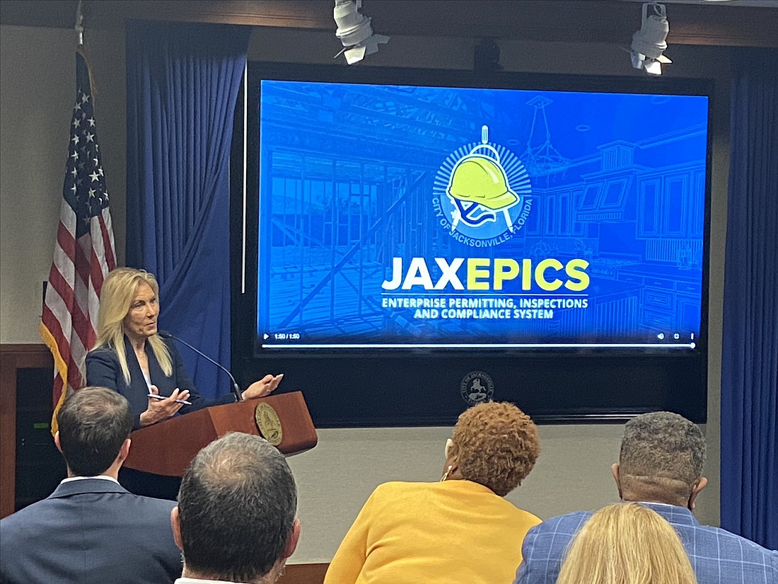 Jacksonville Mayor Donna Deegan shows the new online portal for building permits at a Jan. 10 news conference.
