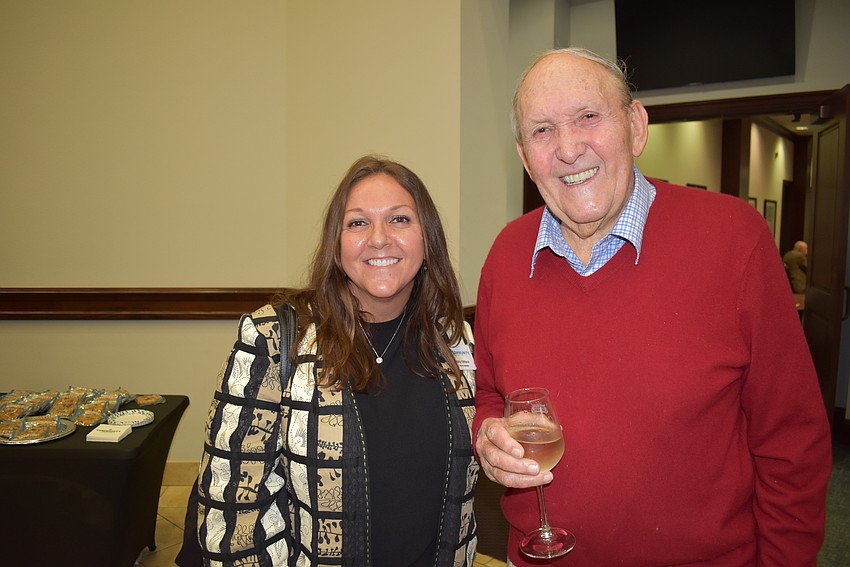Lakewood Ranch Community Foundation Board Member Kelly Gilliland chats with founder John Clarke before the event.