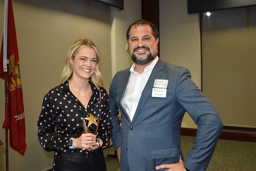 Sarah Powell picks up the Best Lifestyle Director award from Keith Pandeloglou.