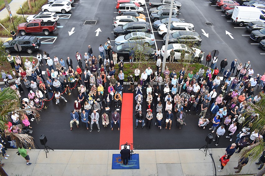 Some of the estimated 500 people who attended the grand opening of the Lakewood Ranch Library on Jan. 12 gather to listen to the ceremony.