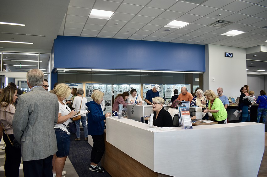 The library is packed with patrons only moments after opening its doors.