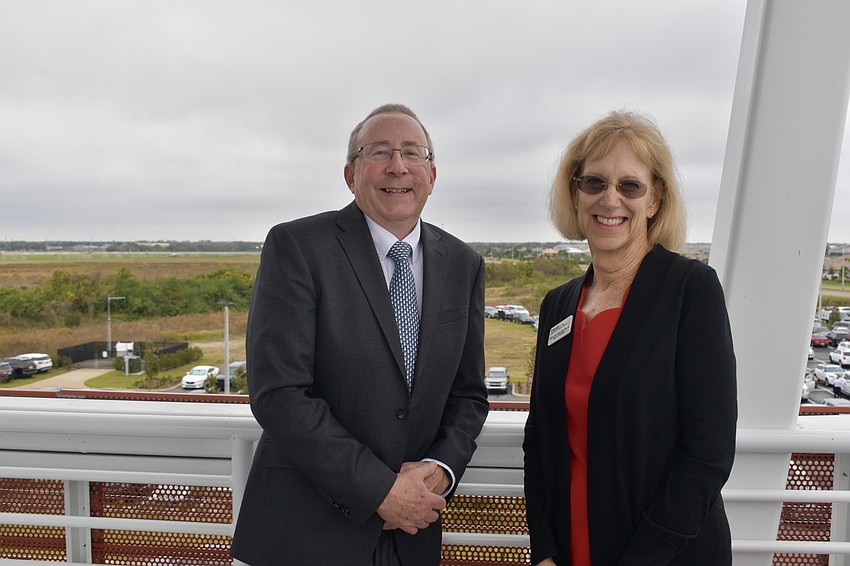 Dave Evans and Sue Ann Miller enjoy the view from the rooftop terrace.