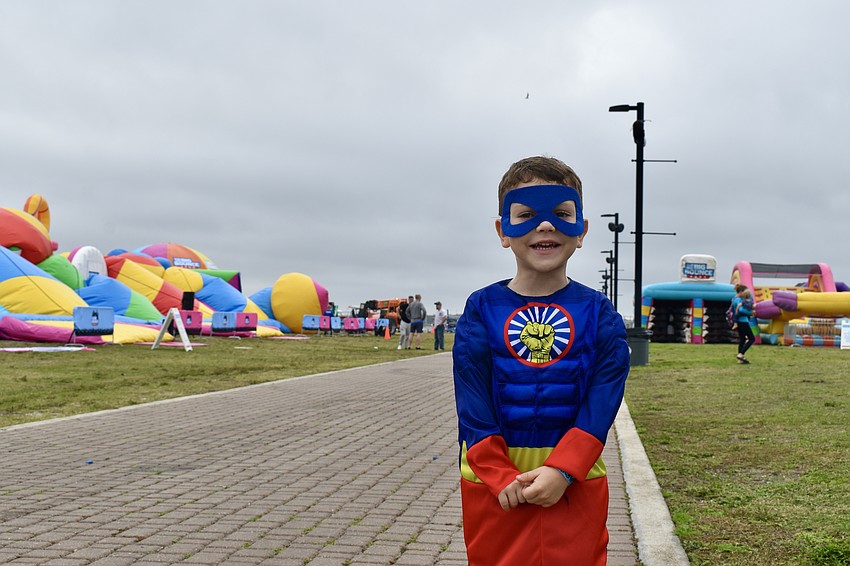 Lucca Domingues, 3, attends The Big Bounce America dressed as a 