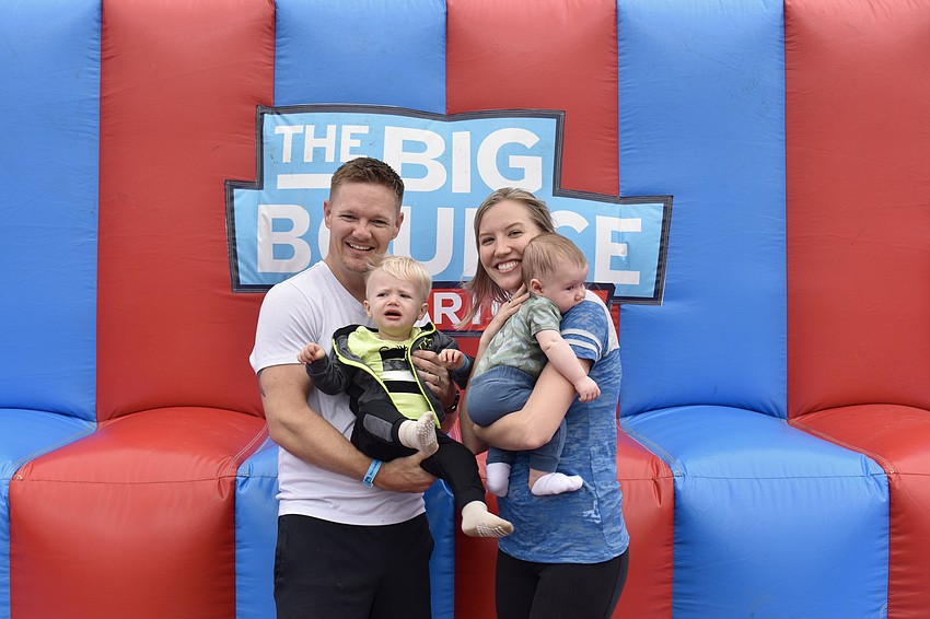 Carter Schwartz is understandably upset that the bounce houses have closed down due to high winds. The 18-month-old is with his dad Chris, mom Megan and brother Cooper.