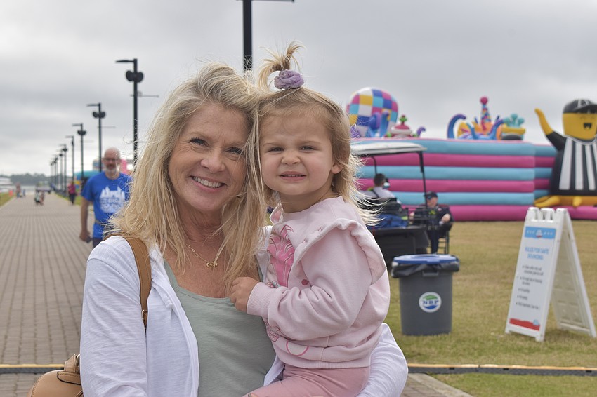 Kristina Waskom is with her 2-year-old granddaughter Gia Talkie. The pair traveled from Tampa to bounce.