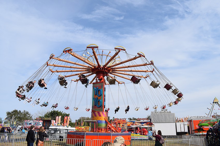 People take to the skies on the swing ride.