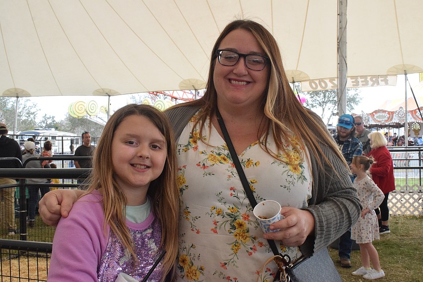 St. Petersburg 9-year-old Lainah Lamerson and Tiffany Pearson visit the Manatee County Fair. Pearson, who is originally from Palmetto, says she hasn't been the fair in 15 years.