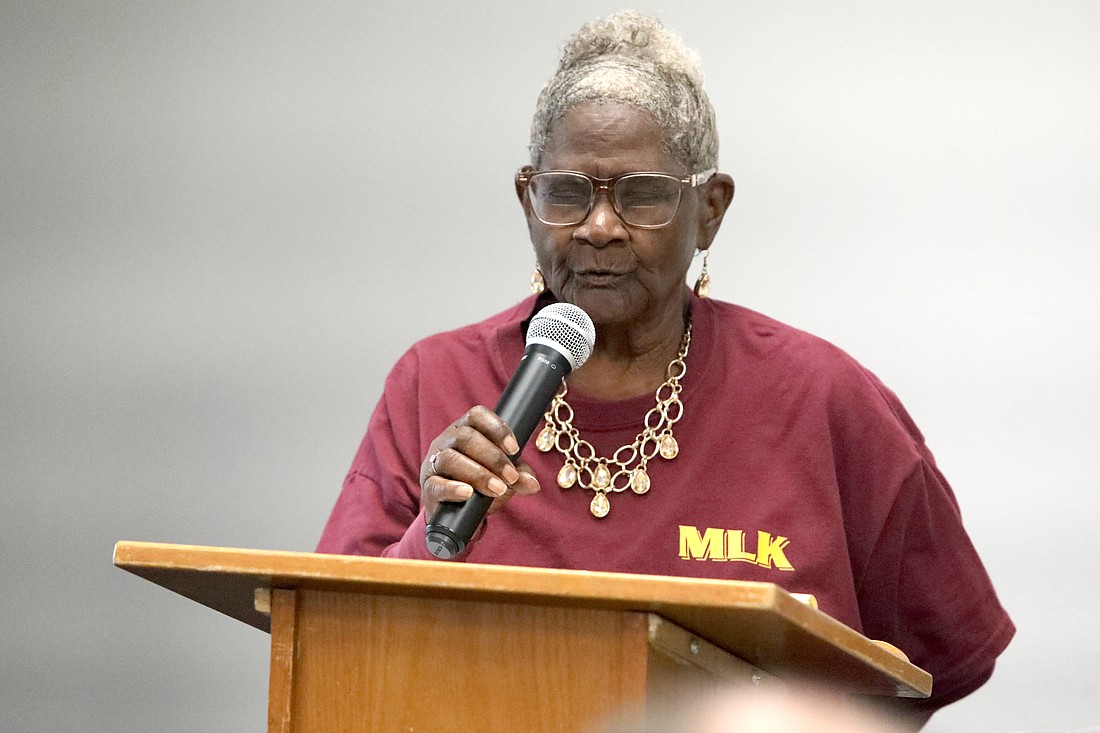 Pastor Daisy Henry leads a prayer on Jan. 13, 2024 at the George Washington Carver Community Center as part of Bunnell's annual MLK Celebration. Photo by Brent Woronoff