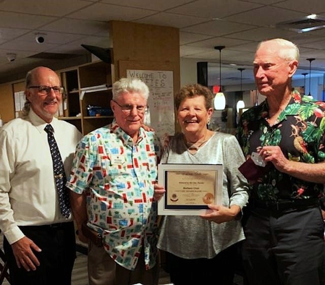 Past Council Chair Greg Evans, Past International Director Neil Spencer, Lion Bobbie Cheh and Past District Governor Glenn Brown. Courtesy photo