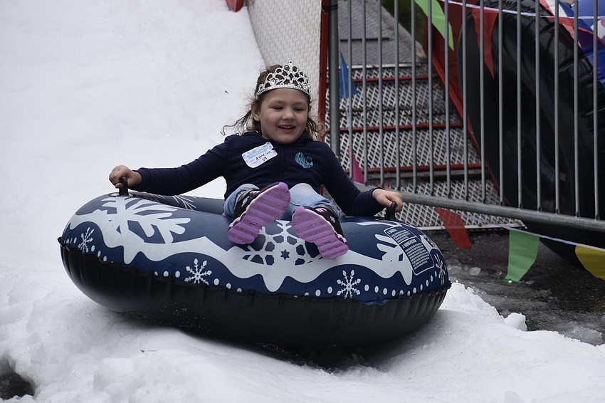 Amelia Grenier, 5, enjoys a snow day while wearing her birthday tiara.
