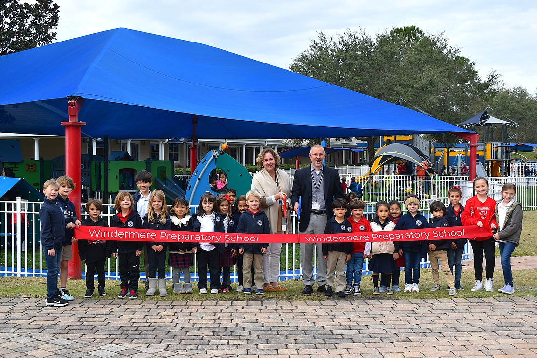 WPS staff and students cut the ribbon for the new Lower School Playground Thursday, Jan. 11.