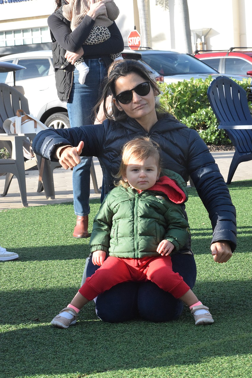 East County's Francesca Alonso and her 1-year-old daughter Teresa Tubb participate in their first UTC Kids Club.